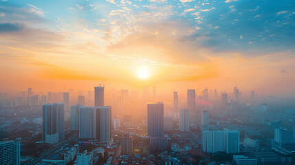 City skyline with modern buildings under a vibrant sunrise and colorful clouds