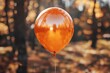 © Vlad - Orange Foil Balloon: Glistering Helium Balloon Floating, Alphabet Design Concept