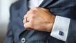 © Mahemud - Businessman adjusting his cufflinks