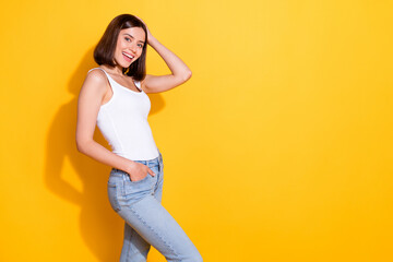 Canvas Print - Photo portrait of attractive young girl posing model poster wear trendy white outfit isolated on yellow color background