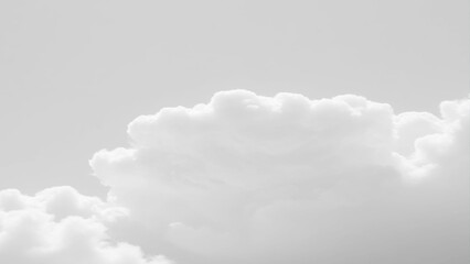 Wall Mural - White Clouds from above. Aerial view of the fluffy white cloud on blue sky. Top view from an airplane over white clouds