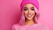 © Raitalinn - A woman with pink hair and a beanie beams, surrounded by a sea of rosy hues.