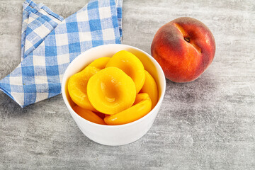 Wall Mural - Ripe sweet and juicy canned peach