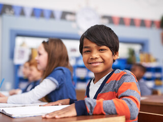 Aufkleber - Portrait, happy and boy in classroom for lesson in growth, child development and notebook for education. Smile, learning and face of student with exam notes, knowledge and study at elementary school