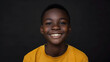 © Mahemud - Portrait of a smiling African teenager boy wearing a pullover.