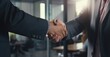 © Stock Pix - A crucial business meeting with a client, with focus on the handshake that signifies agreement