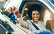 © TamJam/peopleimages.com - Portrait, keys and African woman with new car and drive from auto dealership with smile in motor. Travel, transportation and happy driver with journey and purchase of rental vehicle for road trip