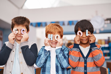Poster - Boys, portrait or happy kids in classroom for letters, toys or alphabet for playing games with friends or students. Group, primary school and face of children for words, development or education