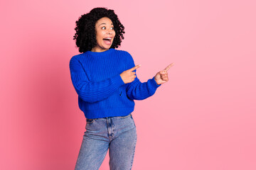 Wall Mural - Portrait of charming lovely woman wear blue knitted stylish clothes recommend benefit empty space isolated on pink color background