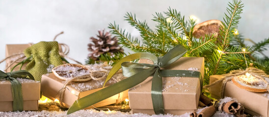 Wall Mural - christmas gift zero waste, eco friendly hand made box packaging gifts in kraft paper wooden table, e
