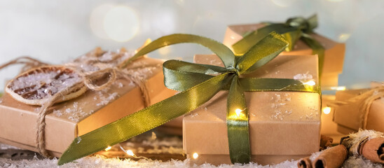 Wall Mural - christmas gift zero waste, eco friendly hand made box packaging gifts in kraft paper wooden table, e