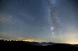 © imageBROKER - Clear starry sky with visible Milky Way and mountains in the background, Hochalp, Urnäsch, Appenzell Ausserrhoden, Switzerland, Europe