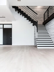 Wall Mural - Modern staircase with black railings in a minimalist home.