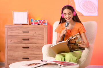 Poster - Young woman with microphone and magazine recording podcast in studio