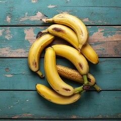 Ripe bananas, distressed turquoise wood background, rustic texture, chipped paint, vibrant yellow fruit, organic spotting, food photography, high contrast, macro detail, weathered surface, natural lig