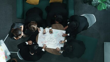 Poster - top down aerial view of group of smart diverse business people brainstorm marketing idea while writi