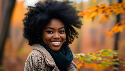 Wall Mural - Joyful serenity of an African American woman amidst the vibrant colors of an autumn forest, celebrating the beauty of nature and the seasonal landscape