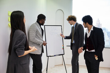 businesspeople meeting and presenting about work or project on white board in the office