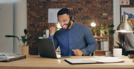 Canvas Print - Man, laptop and headset for call center, celebration and customer service with contact us or sales in office. Agent, happy and achievement in workplace for communication, success or technical support