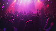 © Cavad - A vibrant crowd pulsates with energy at a concert, where a live band captivates the audience with a dynamic performance. The atmosphere is electric, filled with the sounds of rock music as fans dance