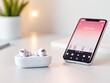 © Mnt - Stylish wireless earbuds beside a smartphone showcasing music playback, perfect for tech and lifestyle themes.
