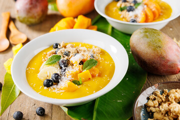 Canvas Print - Close-Up of smoothie Bowl with Mango, Blueberry, and Coconut – Healthy Breakfast