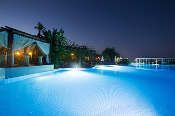 Wall Mural - Swimming pool at night. Water pool at night