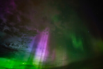 Northern lights.Aurora borealis background with starry sky