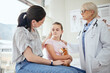 © Flashizzle/peopleimages.com - Mom, girl and sad with pediatrician with diagnosis on illness, sickness and feedback or report at hospital. Female doctor, parent and worried with kid on consultation for healthcare with support