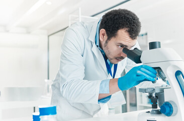 Poster - Microscope, man and scientist in laboratory for science breakthrough, clinical trial and discovery. Biotechnology, medical equipment and vaccine research with petri dish for mpox cure development