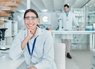 Wall Mural - Happy woman, portrait and scientist with goggles at laboratory for medical science or microbiology. Young, female person or biologist with smile for job or career in scientific forensics at lab desk