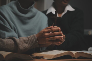 Wall Mural - Christian group are praying to god with the bible and sharing the gospel. Concept of faith for god.