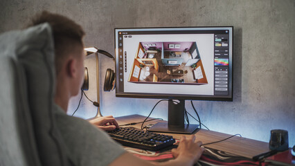Fototapete - Young 3D designer creates and develops stylish house interior using PC and professional 3D modeling software or design app. Caucasian teenager works remotely on freelance project on computer at home.