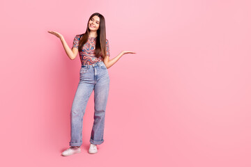 Sticker - Full length photo of shiny attractive lady dressed retro outfit comparing arms empty space isolated pink color background