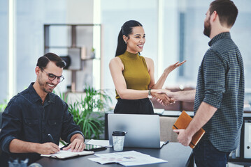 Poster - Handshake, thank you and meeting in office, people and smile for project, paperwork or celebration. Colleagues, holding hands and creative for journalism, laptop and proud of collaboration or article