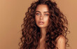 © Milla - Perfect glam woman with long wavy hair. Model with curly hairstyle and healthy skin. Beauty, hairstyle, makeup and cosmetics