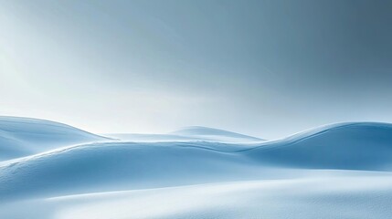 Poster - A serene winter landscape showcasing soft, undulating snow-covered hills under a tranquil sky. Perfect for winter themes.