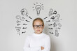 © millaf - Curious child girl with light bulb and question marks on white background. Education and idea concept