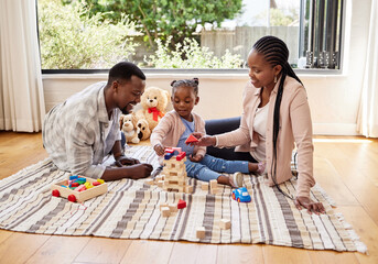 Sticker - Black family, growth and building blocks with girl learning from parents on floor of living room. Kid, education and toys for child development with father and mother teaching daughter in home lounge