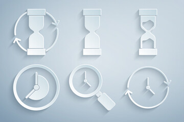 Wall Mural - Set Magnifying glass with clock, Old hourglass, Clock, and icon. Vector