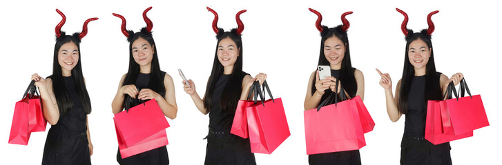 Collection of Young pretty woman wearing devil costume hand pointing and holding shopping bags isolate on transparent background