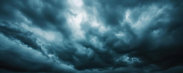 Poster - An ominous sky filled with dark clouds, evoking a sense of impending storm and atmospheric tension in nature.