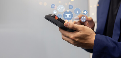 investor businessman hand hold smartphone and access to private banking account application to using