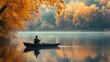 © muhammad - fisherman in a boat on the lake in autumn