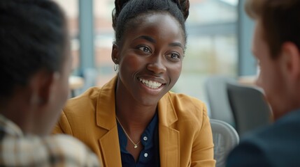 Poster - A woman smiling while talking to two others