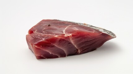 Poster - A slice of raw meat sits alone on a clean white surface, perfect for food photography or illustrations