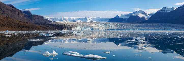 Wall Mural - panorama of the moon glacier, scoresby sund, eastern greenland. mirror reflection of the mountains, 
