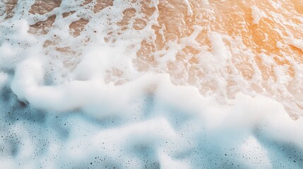 Canvas Print - A close-up view of ocean waves with foam and sunlight reflecting on the water surface.