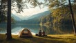 © sirisakboakaew - Minimalist camping couple with a simple tent and few belongings, enjoying a serene lakeside view