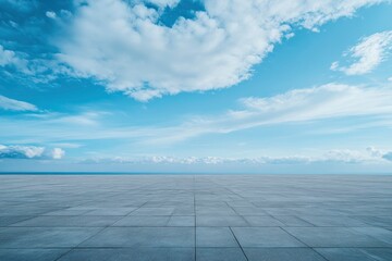 Wall Mural - Beautiful Blue Sky Background with Cloud Horizon and Empty Concrete Floor, perfect for showcasing concept cars, ai